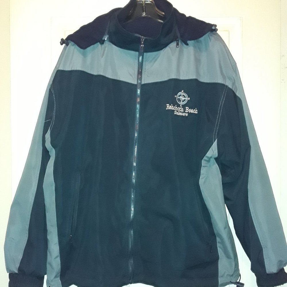 Womens reverseable hooded windbreaker size Med.